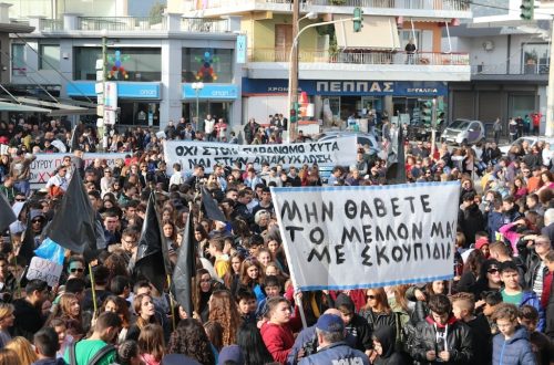 people gathered in the streets in a rally